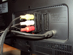 The backside of a TV and the SCART port