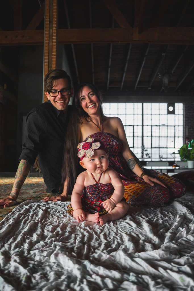 Skin Motion founder Nate Siggard with Juliana and their daughter