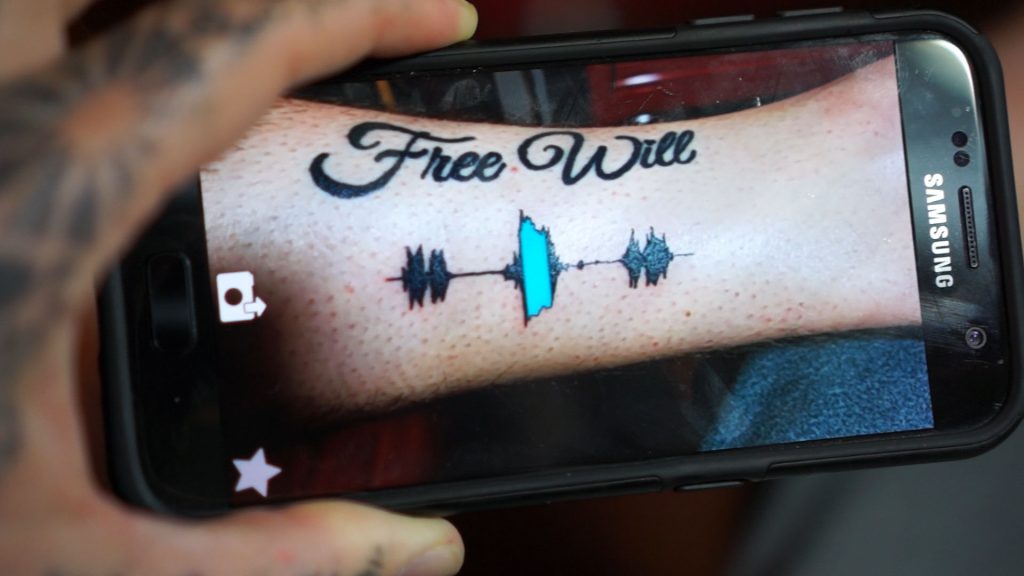 Skin Motion app scanning a Soundwave Tattoo