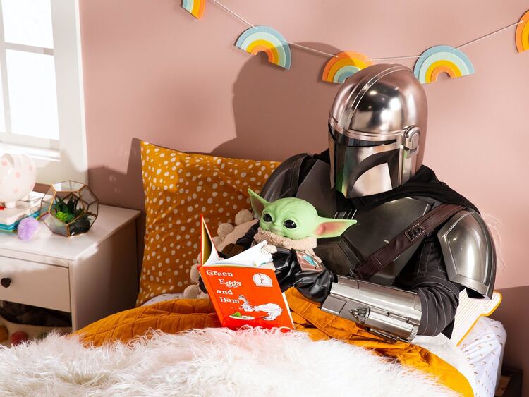 Yoda and the Mandalorian reading bedtime stories.