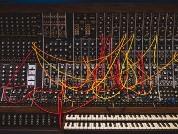 A depiction of an old-fashioned analog synthesizer