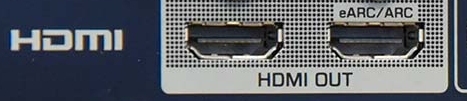 Two HDMI outputs on an AV receiver, one labeled “eARC/ARC”